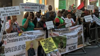 BREAKING: Biafra protesters storm CHOGM as Buhari meets the Queen  %Post Title