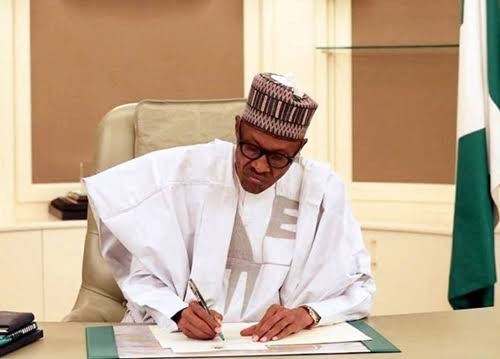 Buhari Signs COVID-19 Regulations  %Post Title