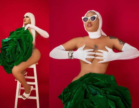 Toyin Lawani barely covers her naked body with a giant green flower to celebrate Nigeria's 60th independence day (photos)  %Post Title